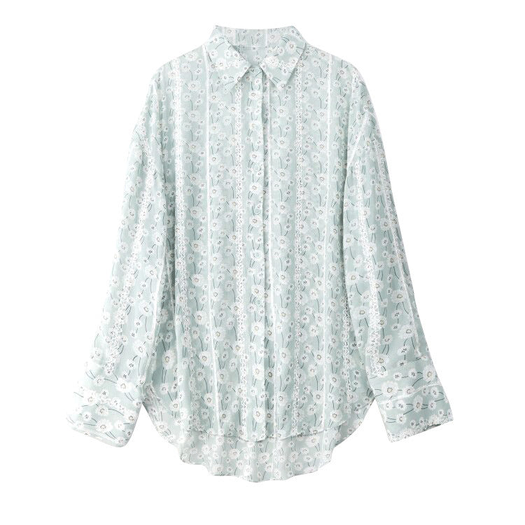 Light blue floral patterned shirt on a white background