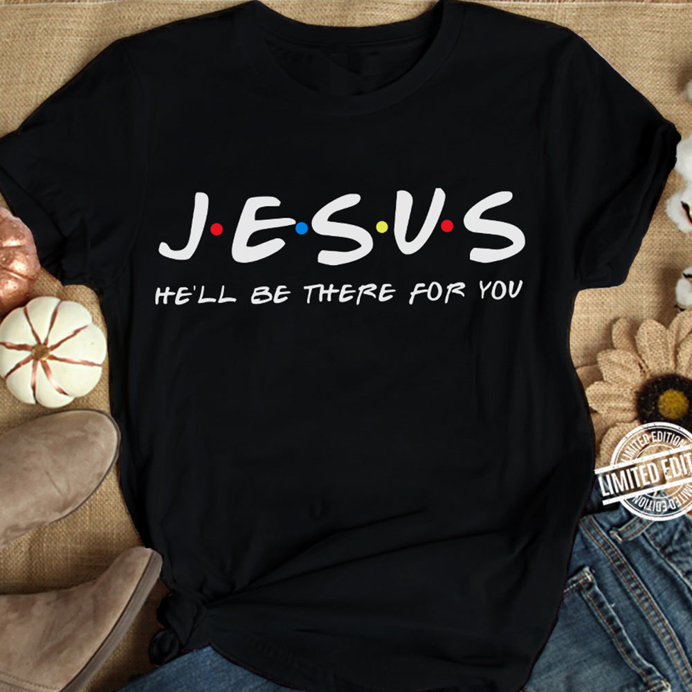 Black t-shirt with 'JESUS HE'LL BE THERE FOR YOU' text on a textured surface.