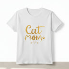 Person wearing a white t-shirt with 'Cat Mom' in gold text on a plain background