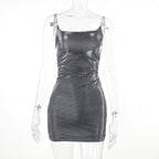 Metallic silver dress on a mannequin against a white background